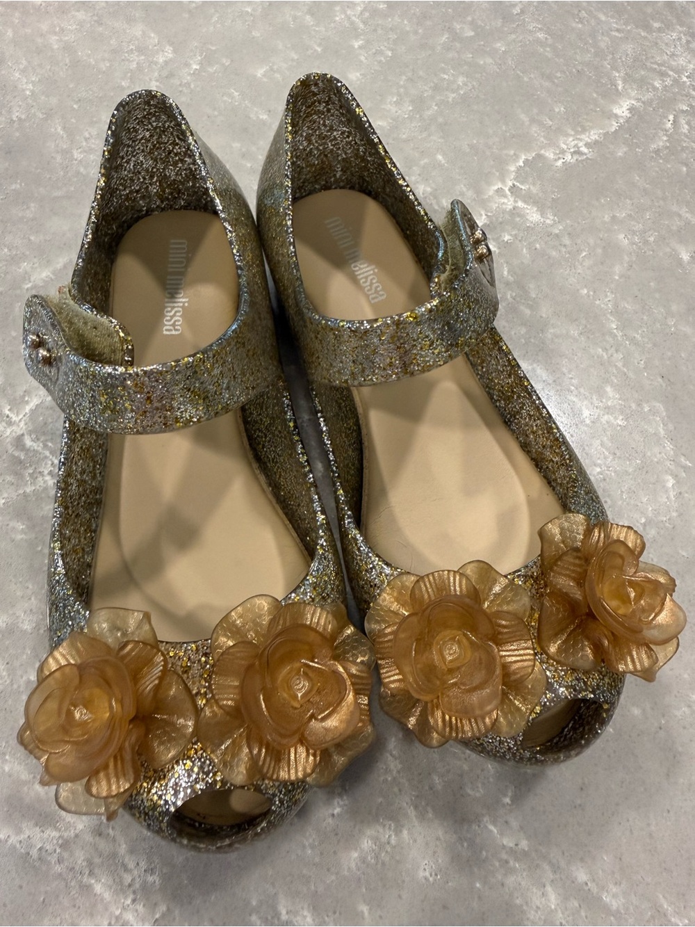 Mini Melissa Girls Gold Glitter Mary Jane Shoes with Champagne Flower Like New